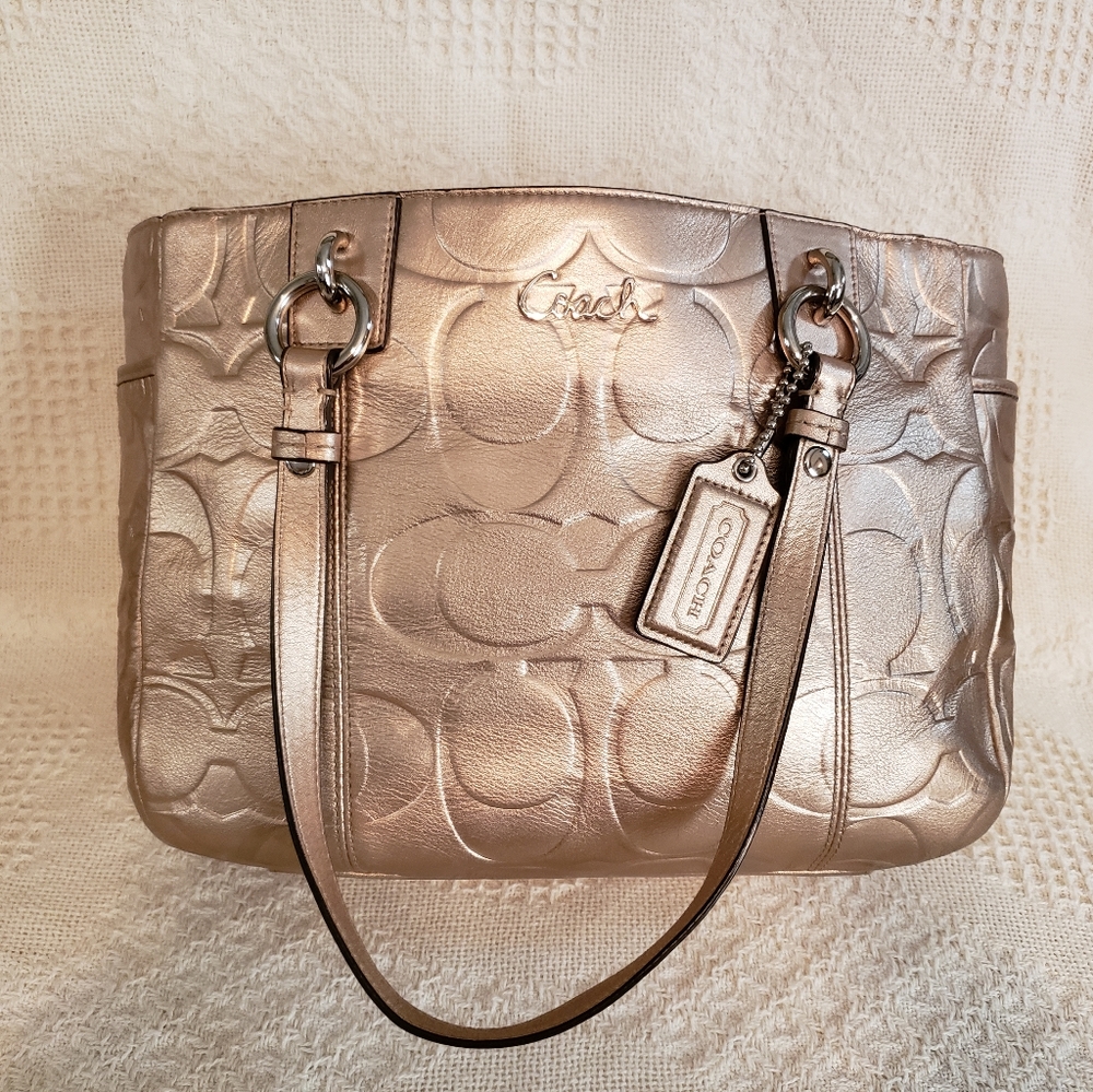 Gold COACH purse.  Signature. Monogram.